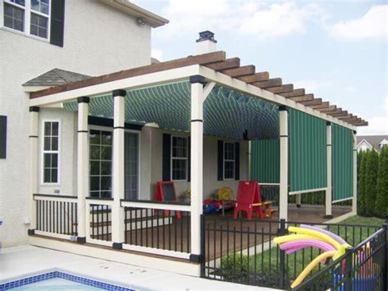Aristocrat vertical window solar shades on a porch — view 3